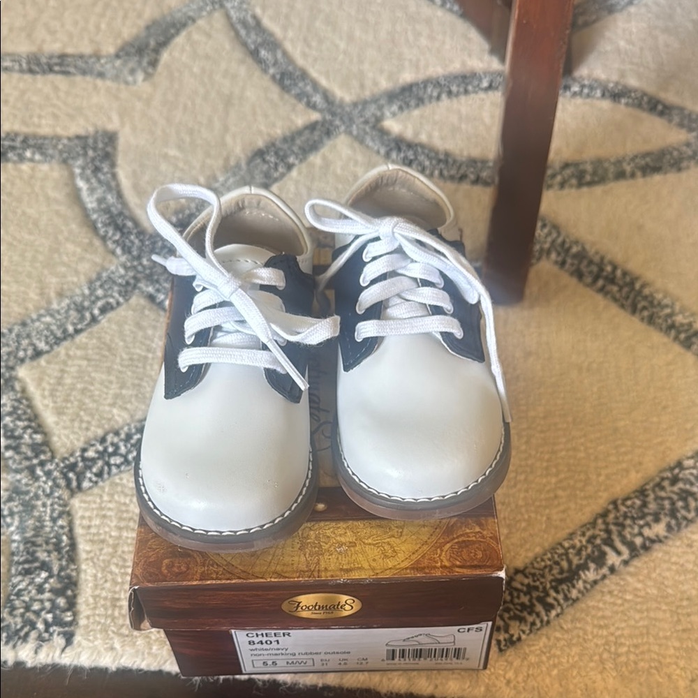 FootMates White and Blue Sneakers with Classic Design